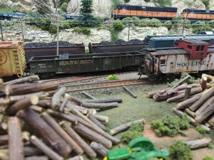 Wood Piles and SOO Caboose.jpg