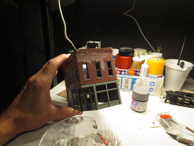 Putting white wash on Cornerstone.JPG
