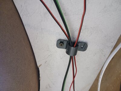 plumbing clamp as wire hanger 1.jpg