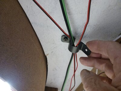 plumbing clamp as wire hanger 2.jpg
