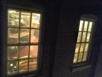 Peeking in Chocolaye factory window.jpg