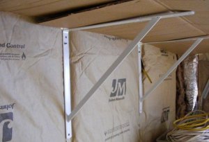 lower shelf brackets, staging yard track supports. mockup cardboard.jpg