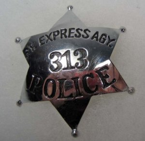 REA Police Badge.jpg