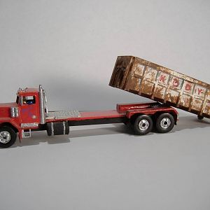 Roll-off dumpster truck