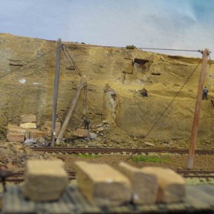 men working on rock.JPG