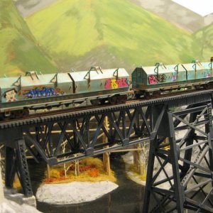 weathered_coil_cars_on_viaduct.jpg