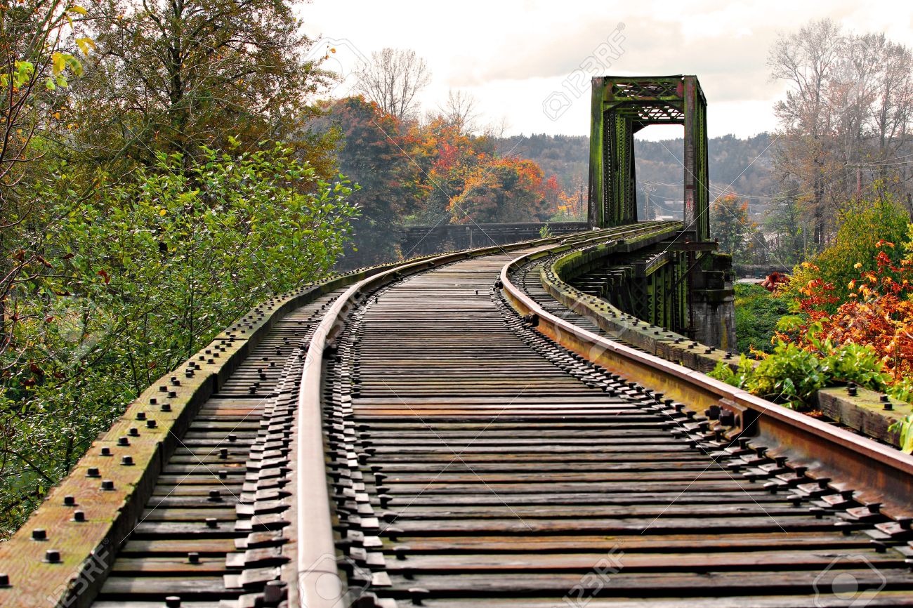 16042571-old-abandoned-railway-track-and-bridge.jpg