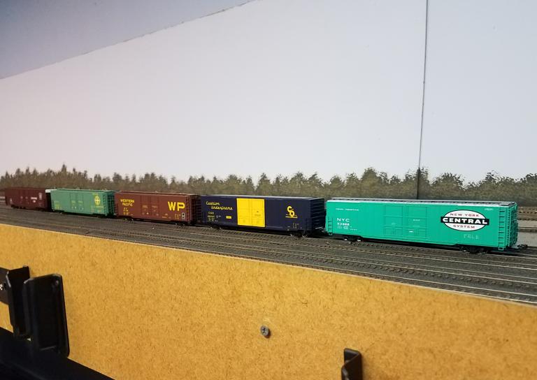Five_60ftDPD_Boxcars_in_a_row.jpg
