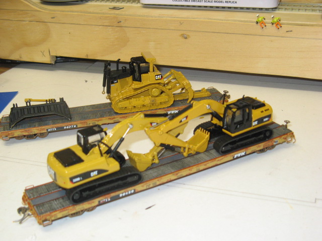 Ho scale 3d printed excavator buckets Cat  loads  depressed center flat cars 