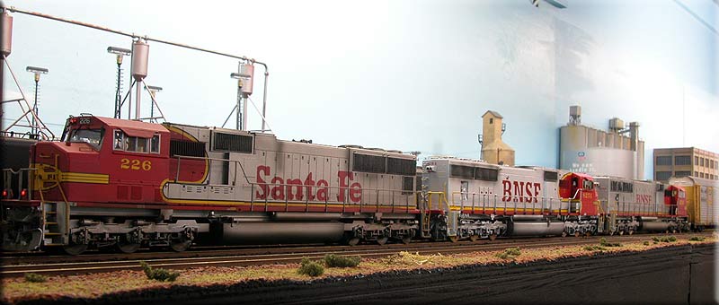SD75`s in red & silver