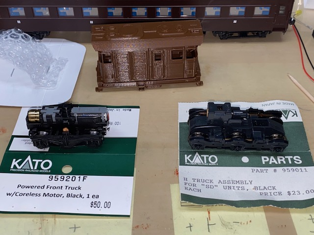 BOTH TRUCKS AND TRAM.jpg