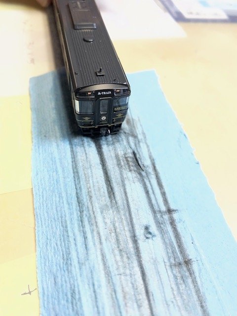 KIHA 185 BEING CLEANED.jpeg