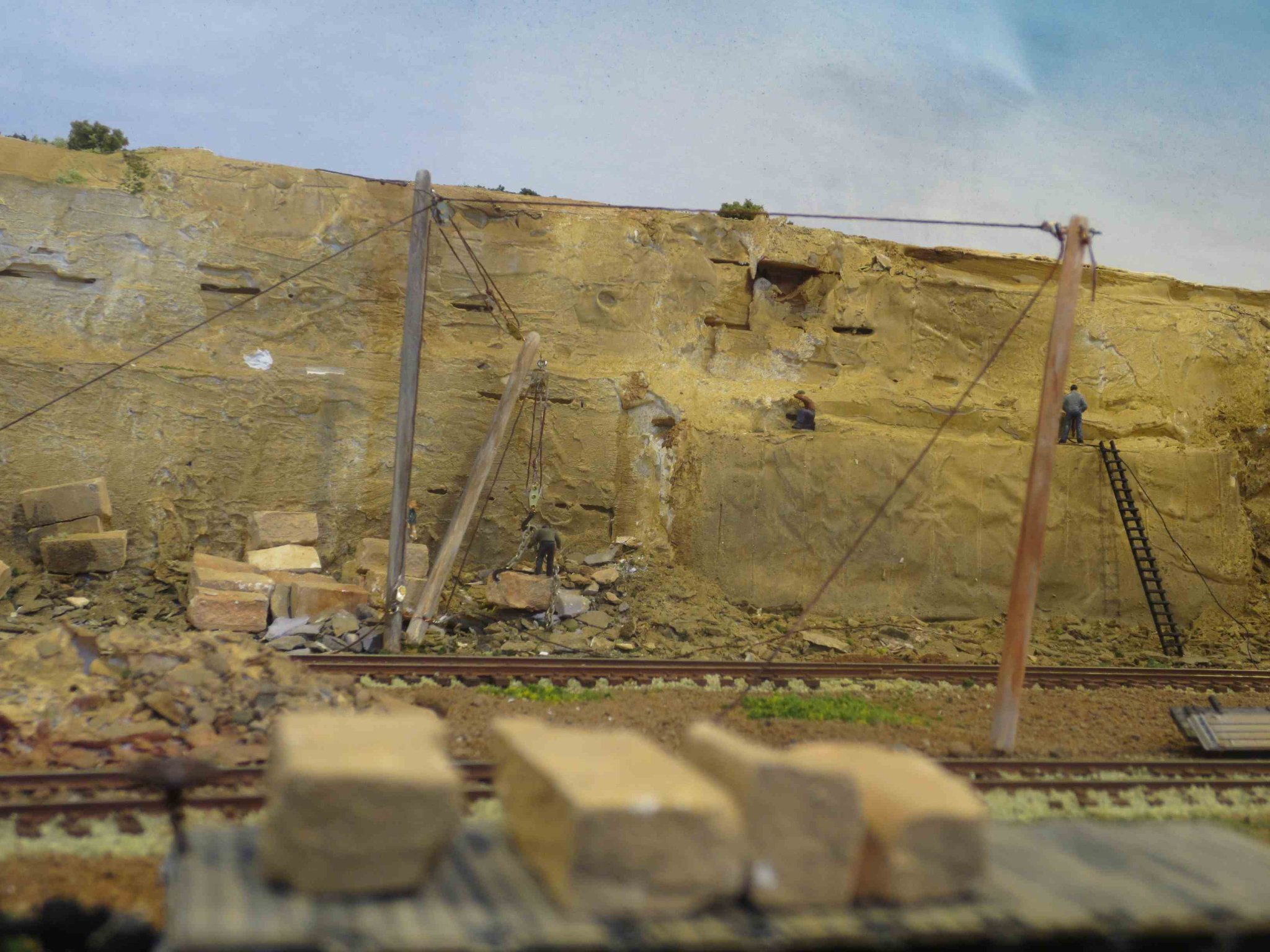 men working on rock.JPG