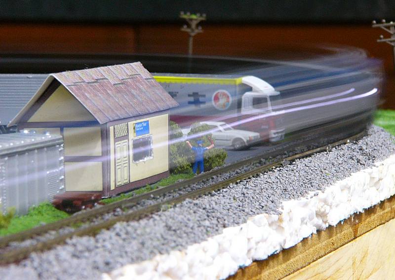 Station Master waving the train
